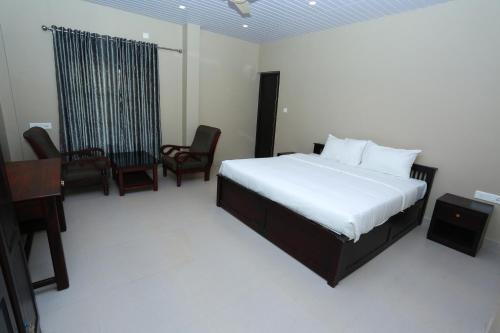 Cama o camas de una habitación en CeeCee Grand