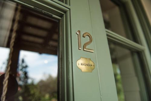 a door with the number two on it at Estancia La Paz Hotel in Ascochinga