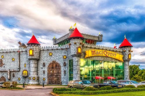 a large castle building with red hats on it at Nature's Paradise in Pigeon Forge