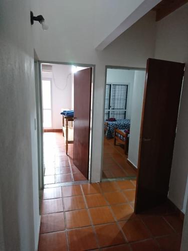 Katil atau katil-katil dalam bilik di Casa familiar en Posadas