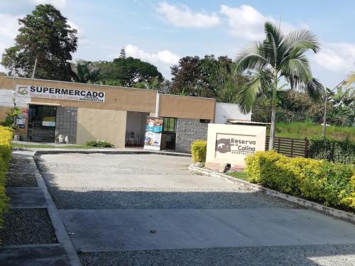 a building with a sign that reads supercomputer lab at Descanso cafetero apartasol Tebaida in La Tebaida