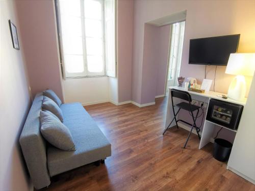 TV a/nebo společenská místnost v ubytování Relais del Principe