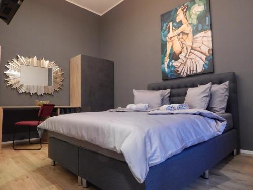 Posteľ alebo postele v izbe v ubytovaní Gold Rooms and Suite