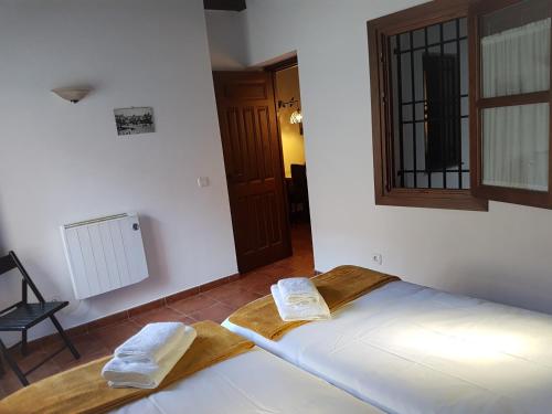Cama o camas de una habitación en El Rey Zagal apartament Granada