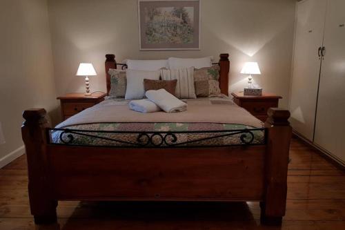 Кровать или кровати в номере Kenmaur Cottage
