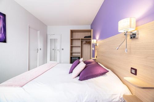 Cama o camas de una habitación en Hotel Helios - Golf