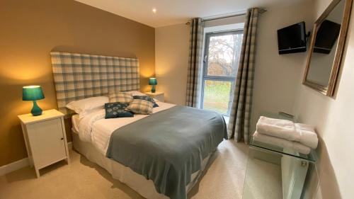 Cama ou camas em um quarto em One Bedroom Apartment Highland Club Scotland