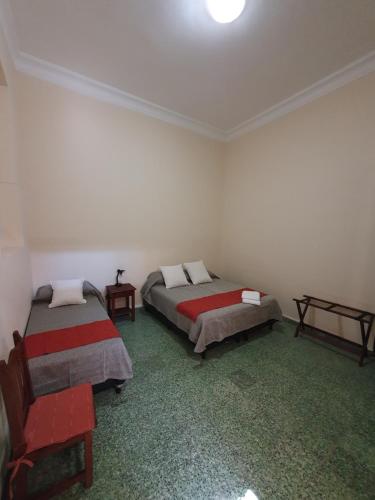 Кровать или кровати в номере Mirador de Salta House