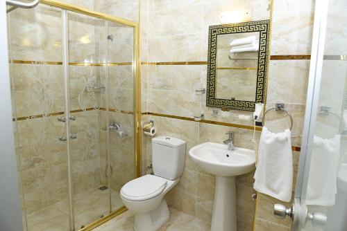 Kylpyhuone majoituspaikassa Hotel Grand Umit