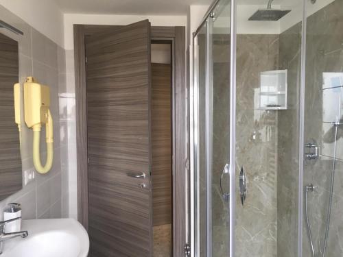 Ванна кімната в Piccolo Hotel Lamezia