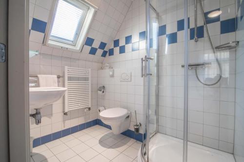 Een badkamer bij Boschzicht