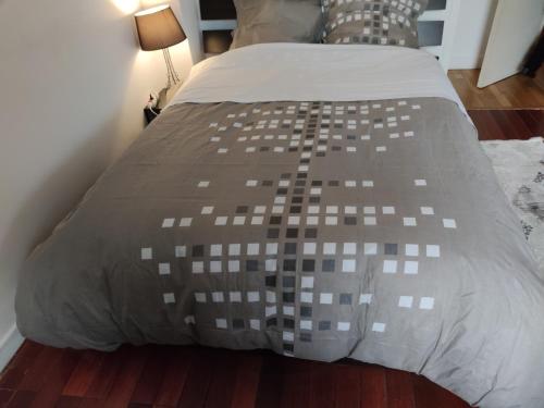 Postel nebo postele na pokoji v ubytování Appartement tout équipé au calme - RefKL