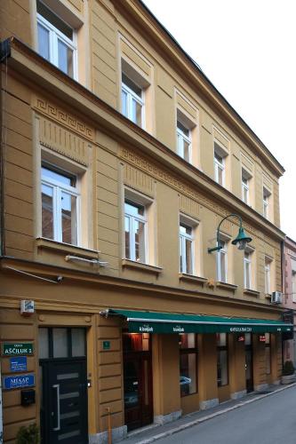 a building on the side of a street at Miaap Apartments in Sarajevo