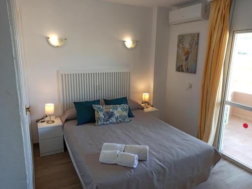 Postel nebo postele na pokoji v ubytování Apartamento en edificio Stella Maris