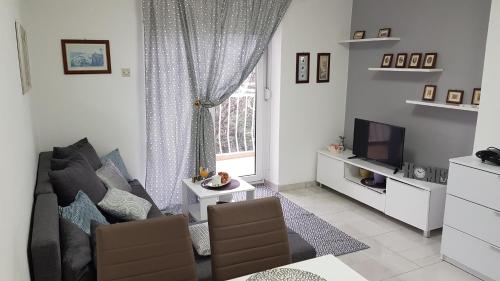 TV a/nebo společenská místnost v ubytování Apartman Ivan