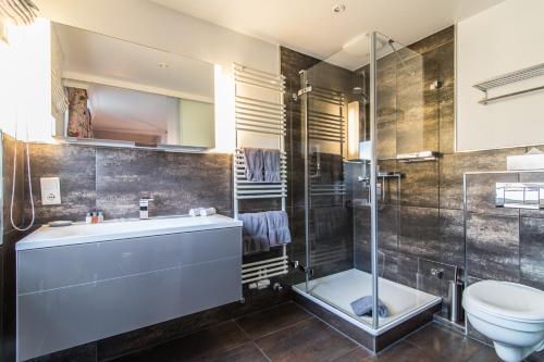 Salle de bains dans l'établissement Hotel Norderriff