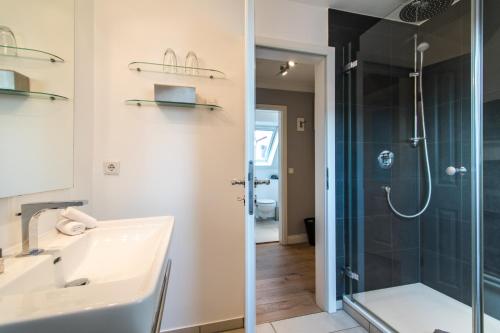 Salle de bains dans l'établissement Hotel Norderriff