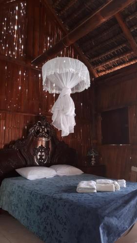 Postel nebo postele na pokoji v ubytování Hostal Villa Brisa