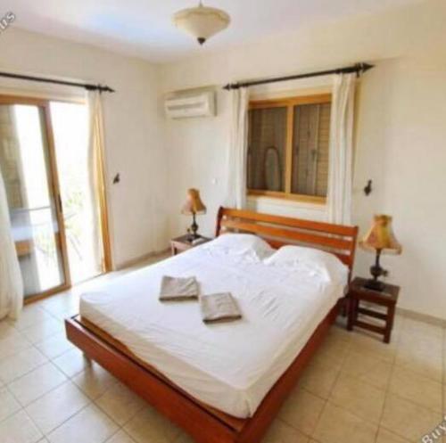 Postel nebo postele na pokoji v ubytování Sunrise Villa