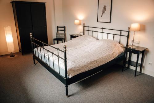 Ein Bett oder Betten in einem Zimmer der Unterkunft Ferienwohnung am Federsee