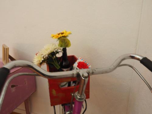 a bike with flowers in a bike holder at The Portuguese Element in Faro