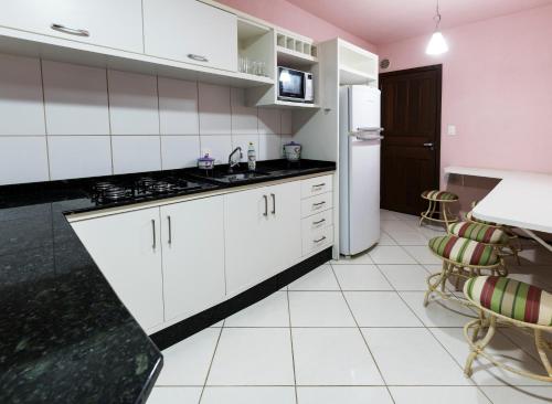 Dapur atau dapur kecil di Pousada Vila Taquaras