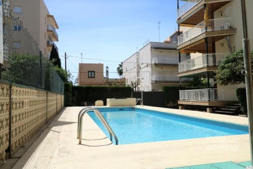 The swimming pool at or close to InmoBooking LeriMar