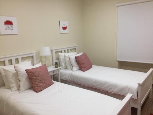 Кровать или кровати в номере Casa do Meio