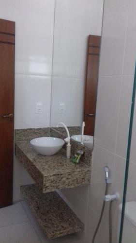 Ванная комната в Pousada Tia Tuquinha