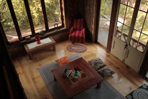 an overhead view of a living room in a tree house at Loft del Rio in Cajon del Maipo