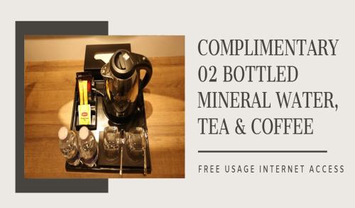 a complimentary complimentary mineral water tea and coffee at Thanh Long Hotel - Tra Khuc in Ho Chi Minh City