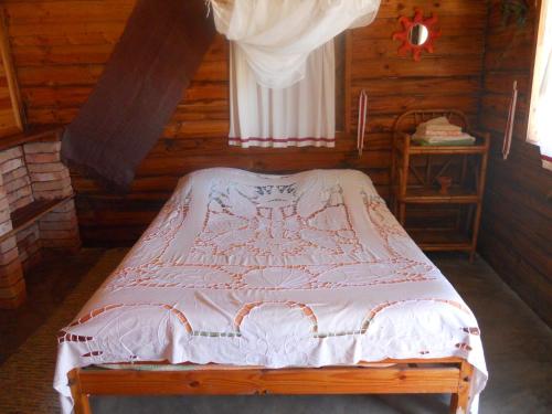 Postel nebo postele na pokoji v ubytování Longo Vezo