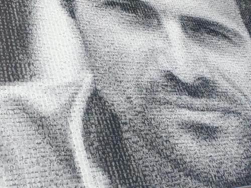 a close up of a persons face on a rug at SMILE APPARTS - Appartements - Au coeur de Lorient - Au calme - Tout Confort in Lorient