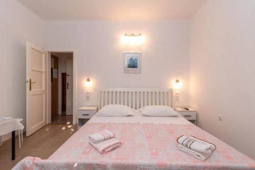 Postel nebo postele na pokoji v ubytování Rooms Feme