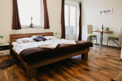 Katil atau katil-katil dalam bilik di Apartments-rooms Vogrinec