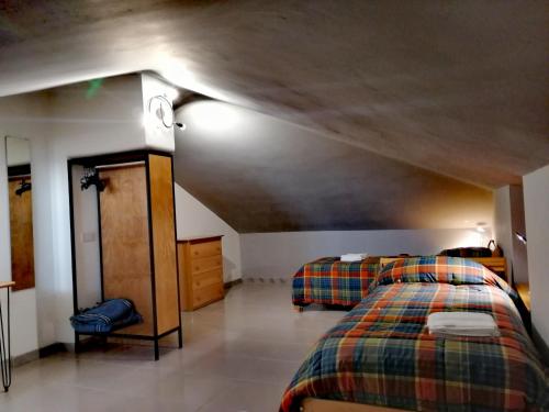 Postel nebo postele na pokoji v ubytování Kalispéra B&B