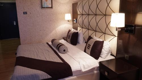 Postel nebo postele na pokoji v ubytování Agsaray Deluxe Hotel & SPA