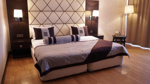 Postel nebo postele na pokoji v ubytování Agsaray Deluxe Hotel & SPA