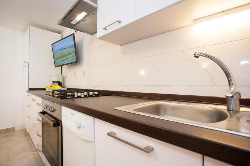 Kuchyňa alebo kuchynka v ubytovaní Apartments Melita