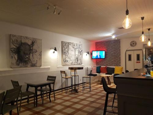 The lounge or bar area at Le Saint Jean