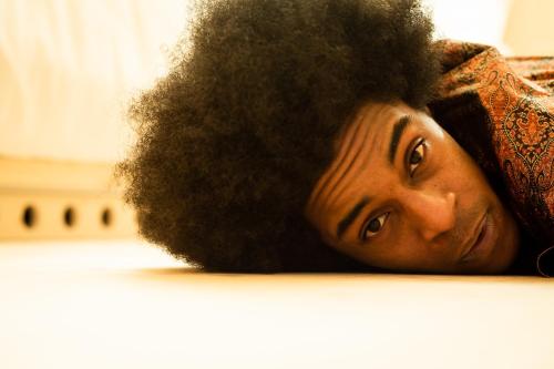 a woman laying on a counter with her hair at Zero Box Lodge Porto in Porto
