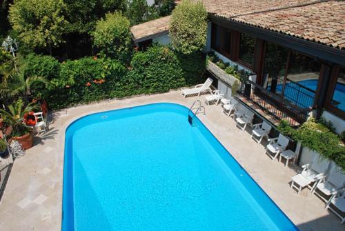 an overhead view of a swimming pool next to a house at Zia Carmela in Montella