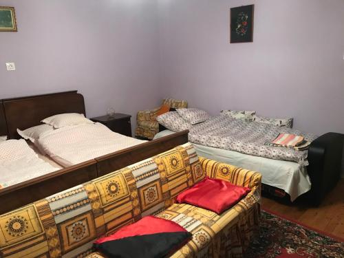 Postel nebo postele na pokoji v ubytování Kereki Retro Vendégház