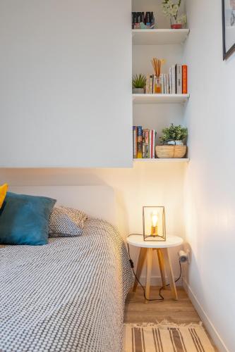 Ein Bett oder Betten in einem Zimmer der Unterkunft Le Cocon Lumière