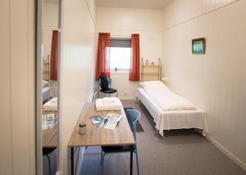 Postel nebo postele na pokoji v ubytování Sognhostel