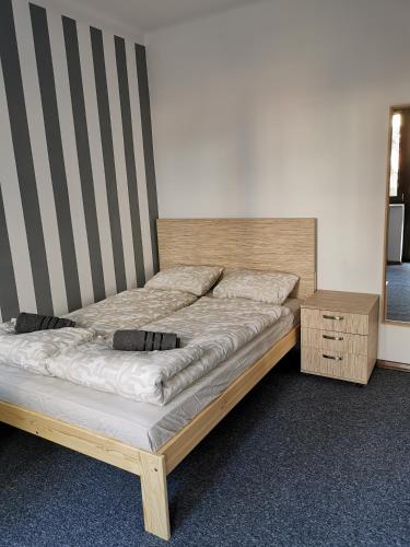 En eller flere senge i et værelse på For rest Hostel