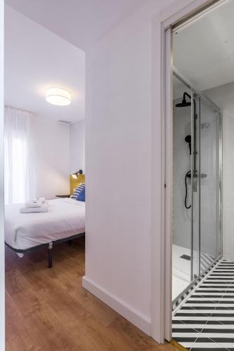 Ένα ή περισσότερα κρεβάτια σε δωμάτιο στο Style Apartments by Olala Homes