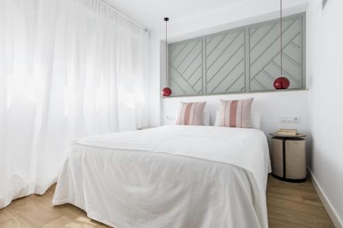 Ένα ή περισσότερα κρεβάτια σε δωμάτιο στο Style Apartments by Olala Homes