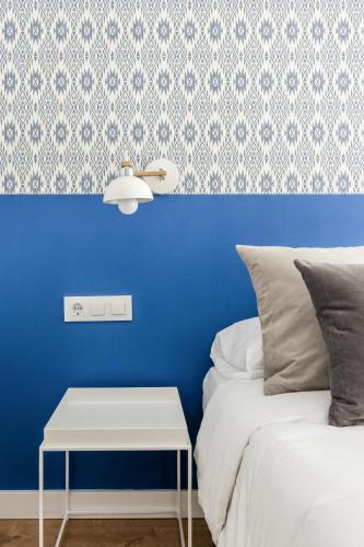 Ένα ή περισσότερα κρεβάτια σε δωμάτιο στο Style Apartments by Olala Homes