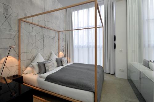 เตียงในห้องที่ Luxury Omaruru-Design-Apartment Deluxe